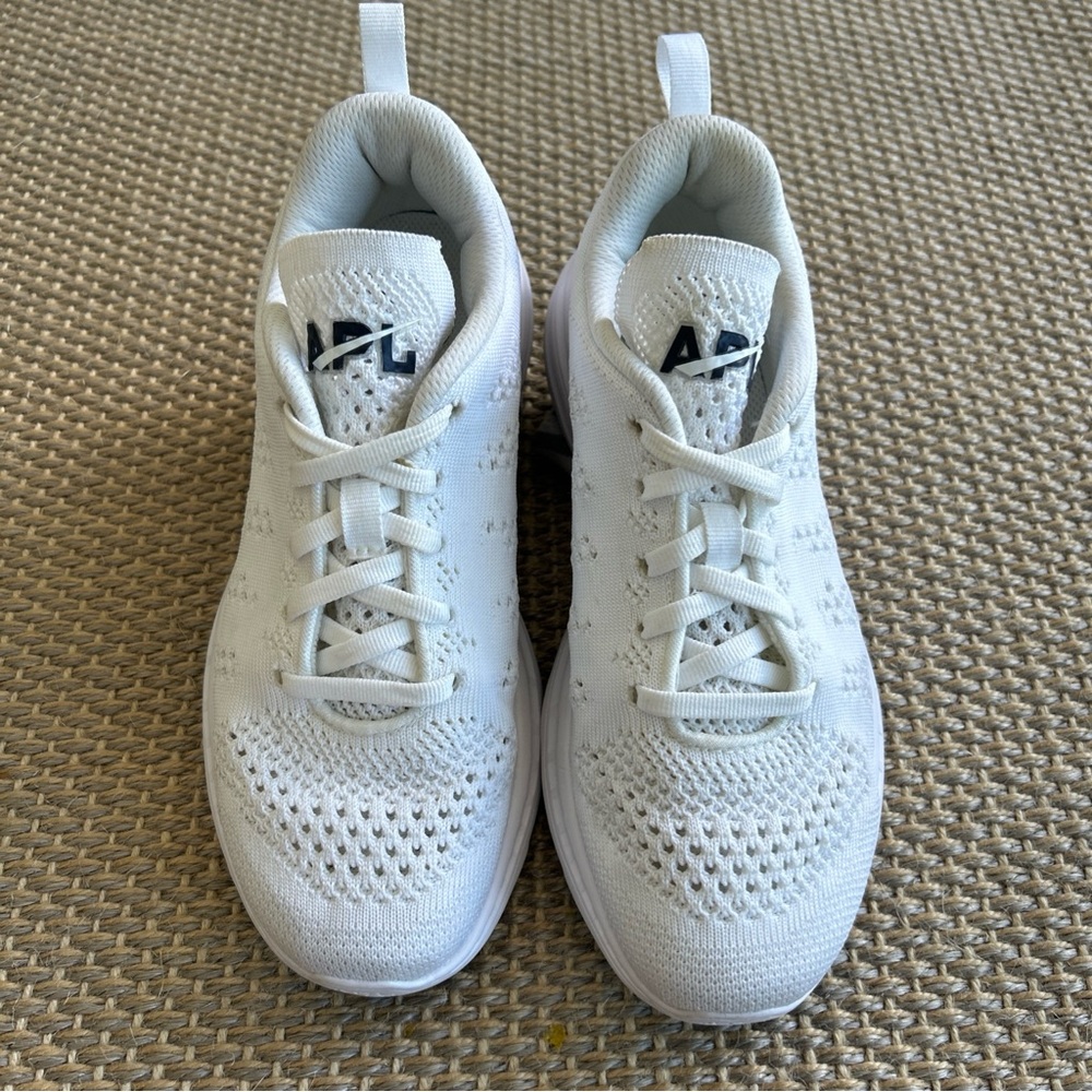 6.5 APL techloom pro women’s white and black running yoga core collection shoes.